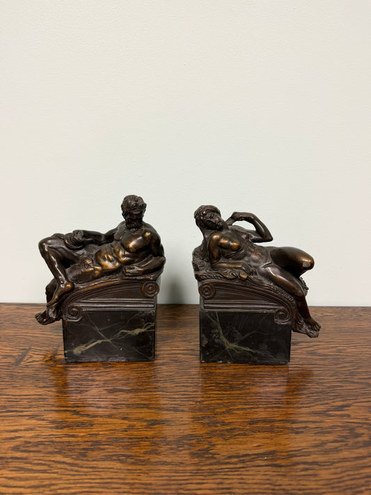 Pair of Neoclassical Bronze Reclining Figures on Marble Bases – Classical Sculptures